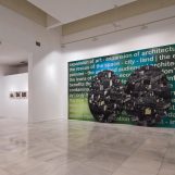 The best views of the city, 2009 Oil on canvas. 108,2 x 78,7 inches. 2 ovals. (275x200cm). Digital print on PVC Mesh canvas. 137,7 x 275,5 inches. (350x700cm)